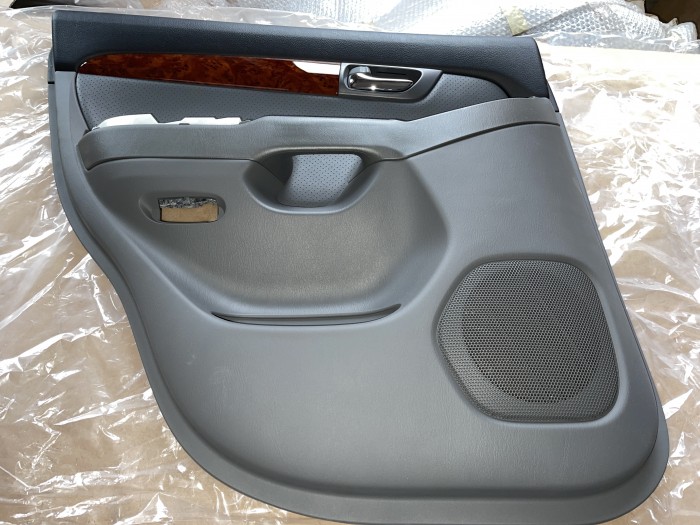 Обшивка двери задней левой Toyota Land Cruiser Prado 120 2002-2009 6764060770B0