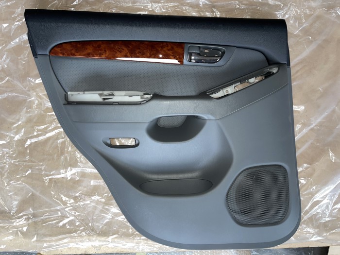 Обшивка двери задней левой Toyota Land Cruiser Prado 120 2002-2009 6764060770B0