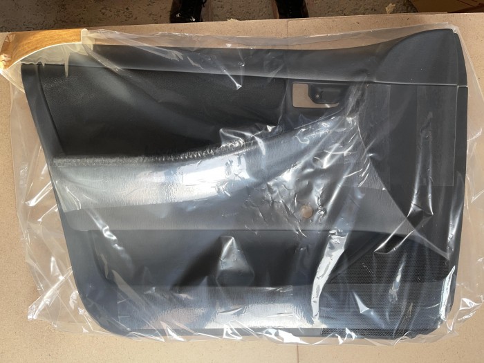 Обшивка двери передней левой TOYOTA Corolla E120 6766013030B1