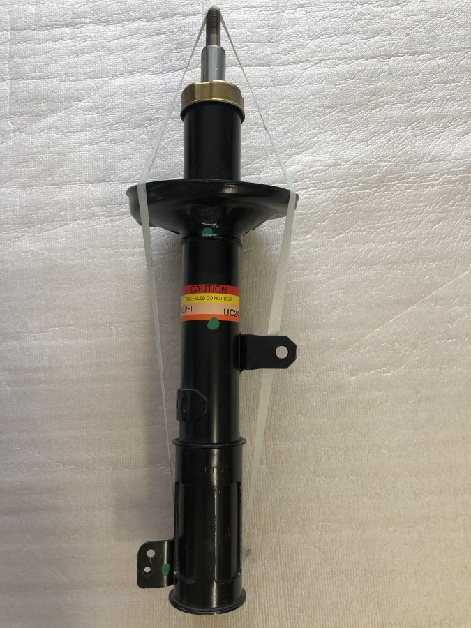 Амортизатор правый TOYOTA DELPHI UC24